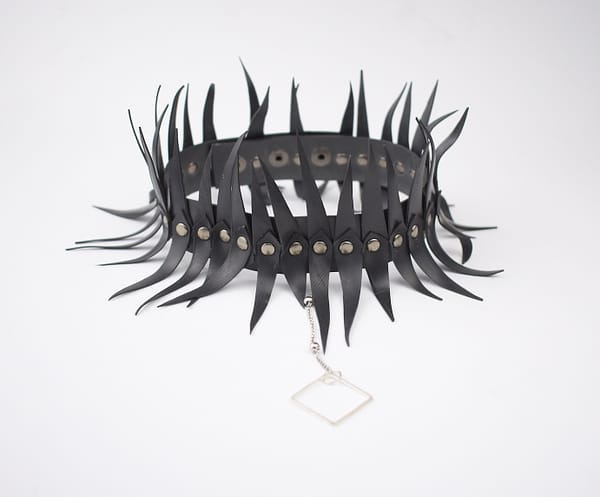 Recyled Jewellery: A BerlinWinter Silver Choker with spikes and studs, featuring a metal chain and a square pendant made from eco-friendly jewelry materials, displayed on a white background. @ Reblack Shop