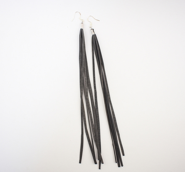 Recyled Jewellery: A pair of Waterfall Earring Plain displayed against a white background. The earrings feature multiple thin strands dangling from silver hooks, exemplifying eco-friendly jewelry practices. @ Reblack Shop